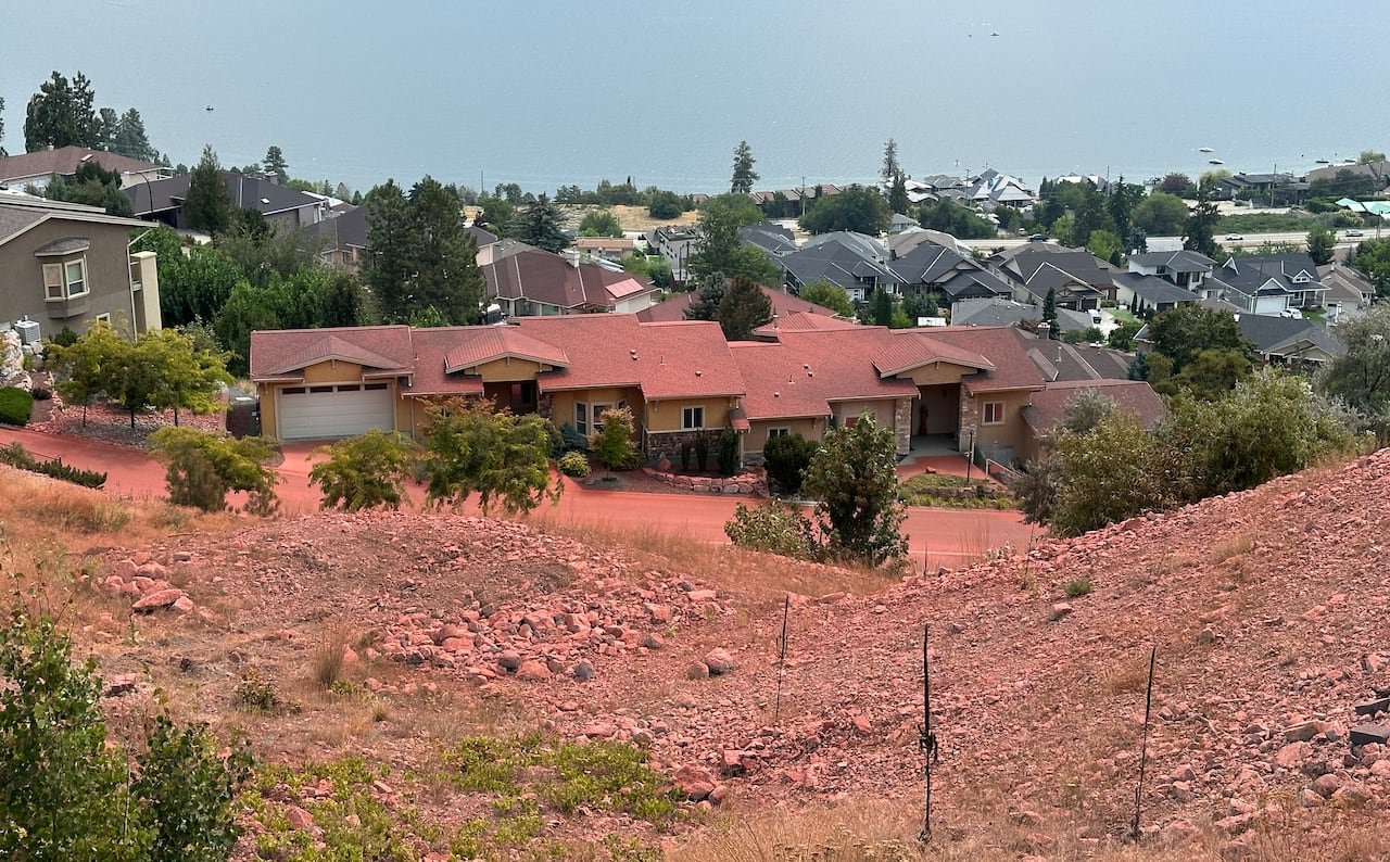 default-270 A residential area with a rocky foreground stained red.