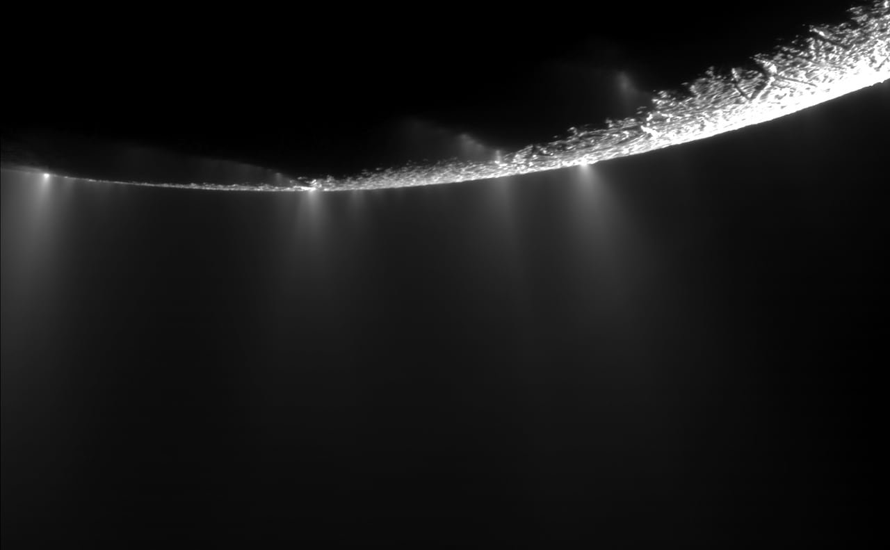 default-337 A moon's crescent showing emerging plumes.