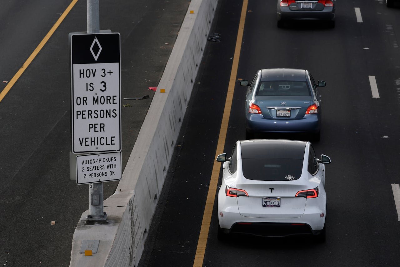 Tesla car in a high-occupancy vehicle lane