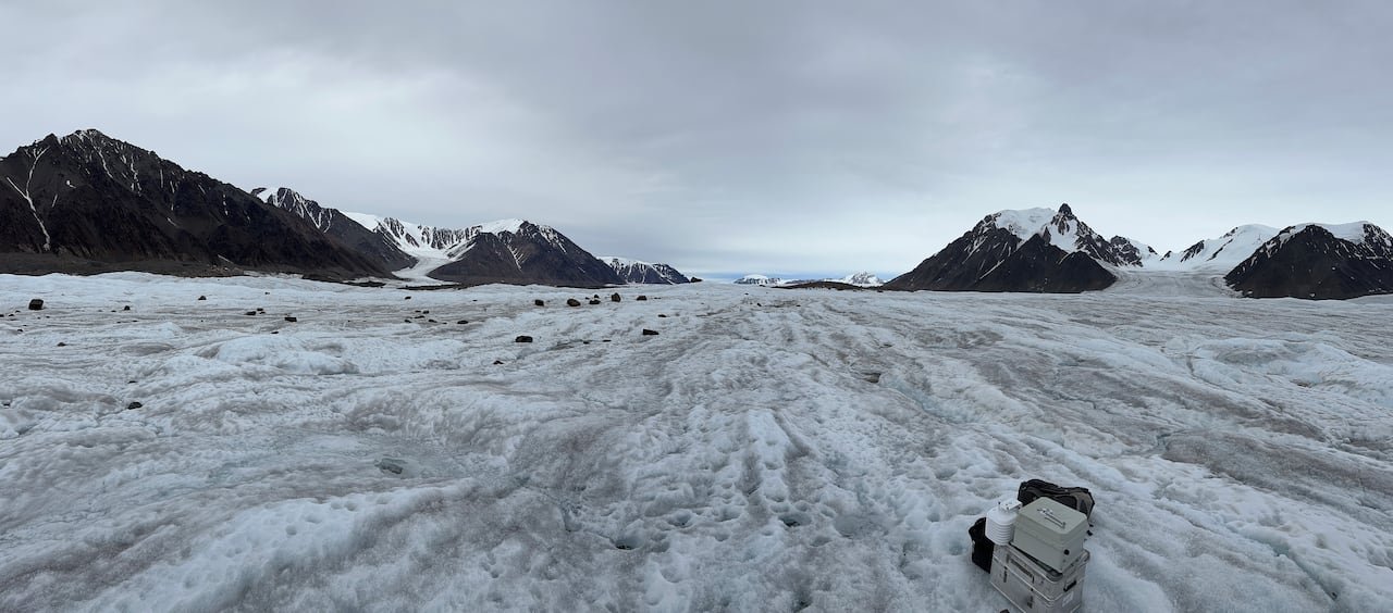 default-504 A University of Ottawa research teams sets up equipment at this glacier in the Canadian Arctic, which is the site of one of the subglacial lakes identified in a new study.
